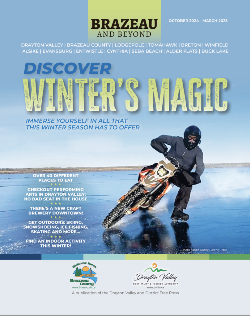 Man on dirt bike ice riding on Lake Wabamun